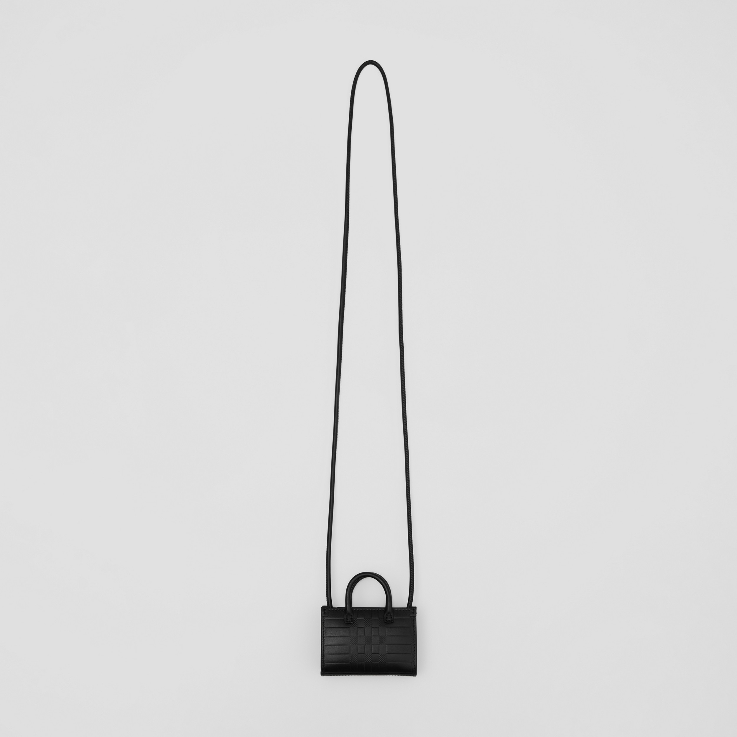 Messenger-Tasche im Miniformat aus Leder mit Karoprägung (Schwarz) | Burberry® - 1