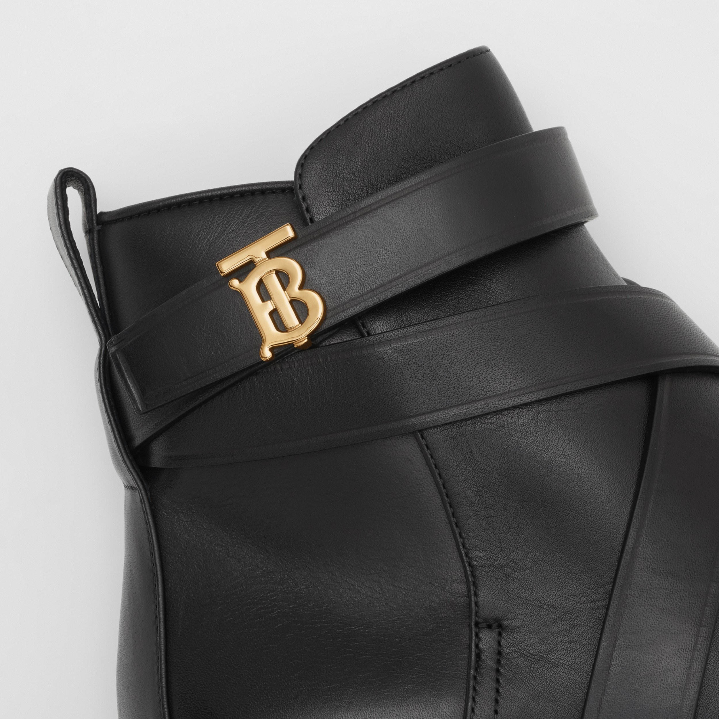 monogram buckle cleat ankle boots