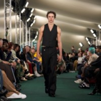 Model wearing Waistcoat and Tailored trousers.