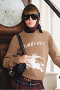 Model wearing burberry knitwear with EKD for the Winter 2025 Campaign