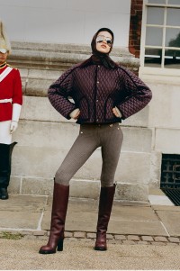 Shot of model Amelia Gray Cropped Quilted Nylon Floriston Jacket in colour Mahogany Brown 