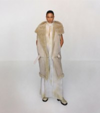 Shearling sleeveless coat in field 