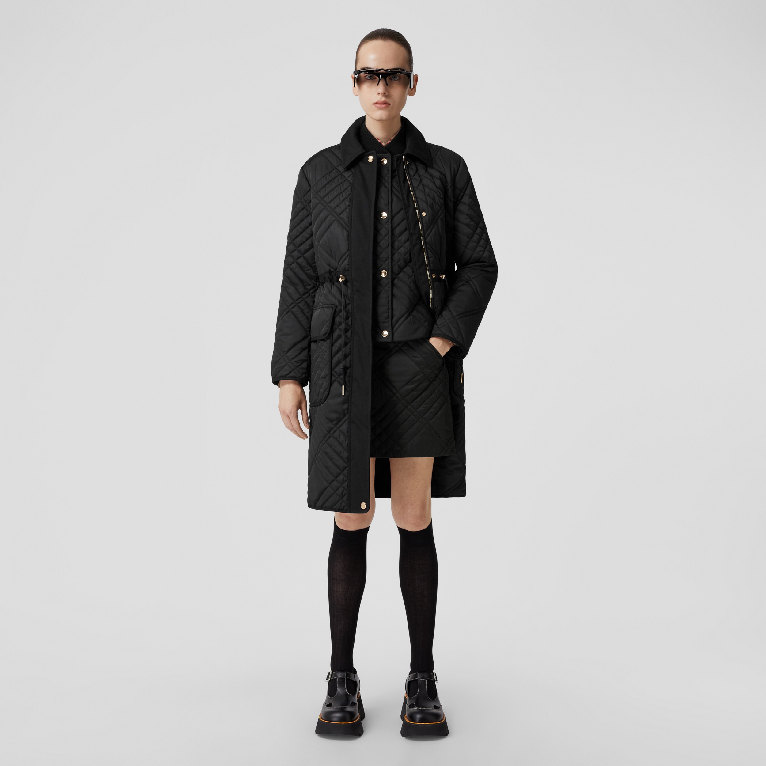 Embroidered Logo Quilted Coat in Black - Women | Burberry® Official - 1