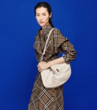 Model wearing Burberry Check Trench Dress paired with Leather Mules and Medium Shield Bag