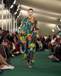 Model wearing Poppy garden embroidered dress.