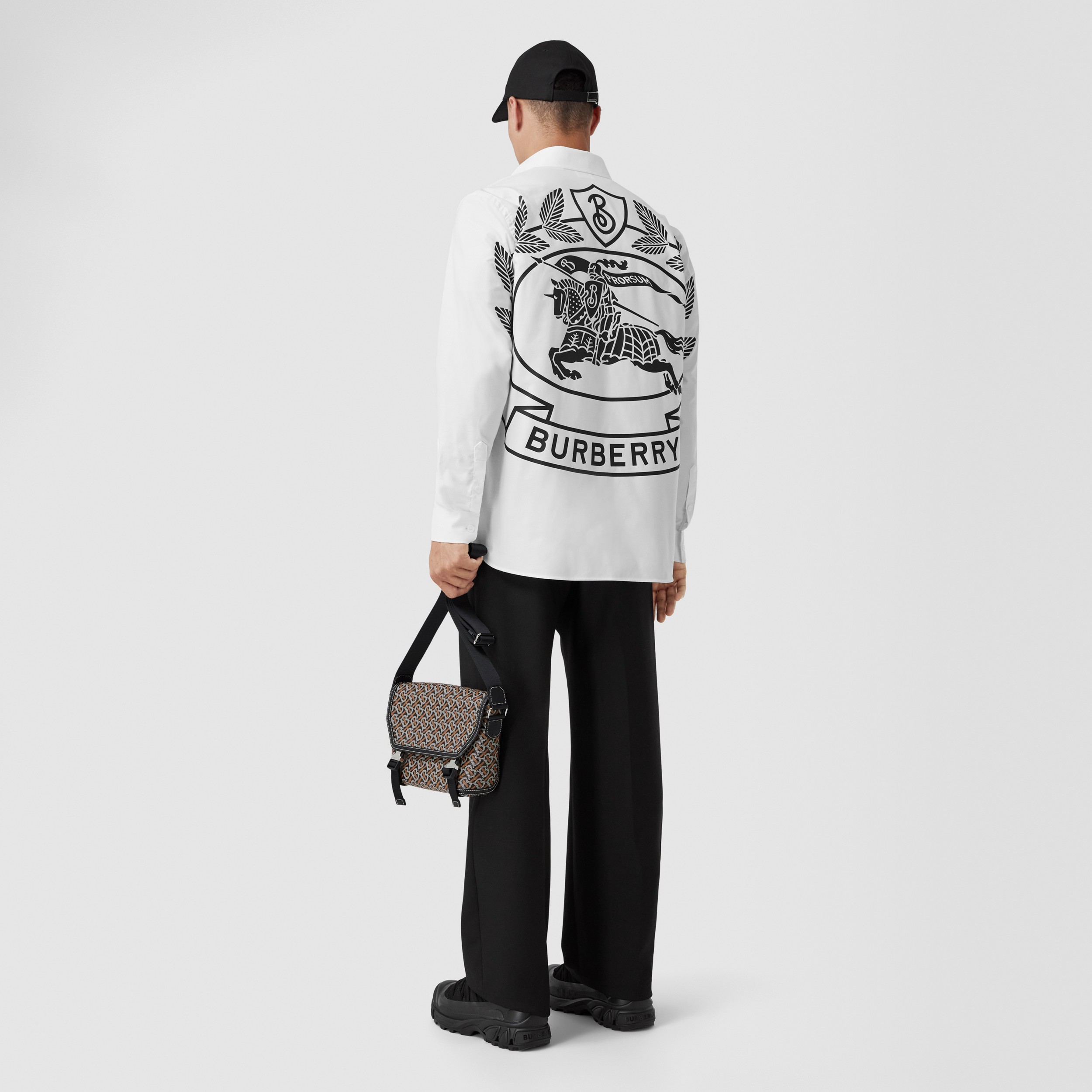 Camicia Oxford oversize in cotone con stampa del cavaliere equestre (Bianco Ottico) - Uomo | Sito ufficiale Burberry® - 1