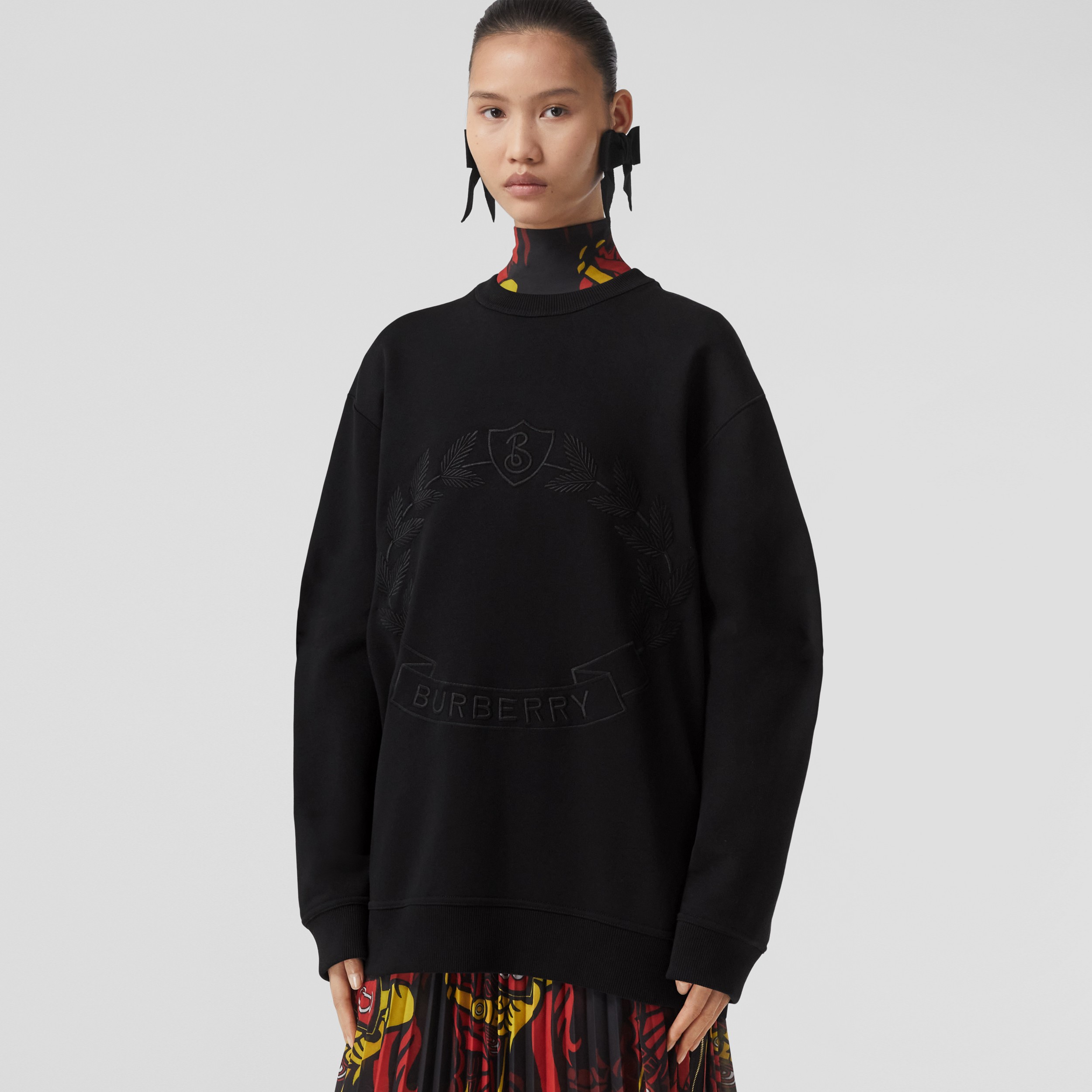Embroidered Oak Leaf Crest Cotton Sweatshirt in Black - Women | Burberry® Official - 1