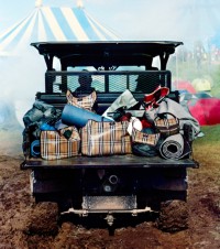 Burberry Festival Campaign featuring a truck with check highland tote bags in colour sand