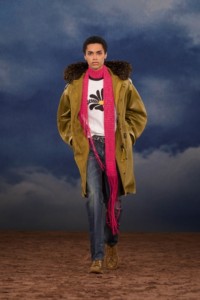 Burberry SS26 Show model Alexis Tiem wearing a Daisy logo cotton T-shirt and a Waxed cotton parka