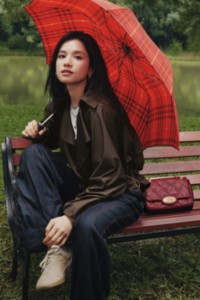 Burberry Chinese Valentine's Day featuring Zhang Jingyi wearing Burberry Strand Clutch and check umbrella in red