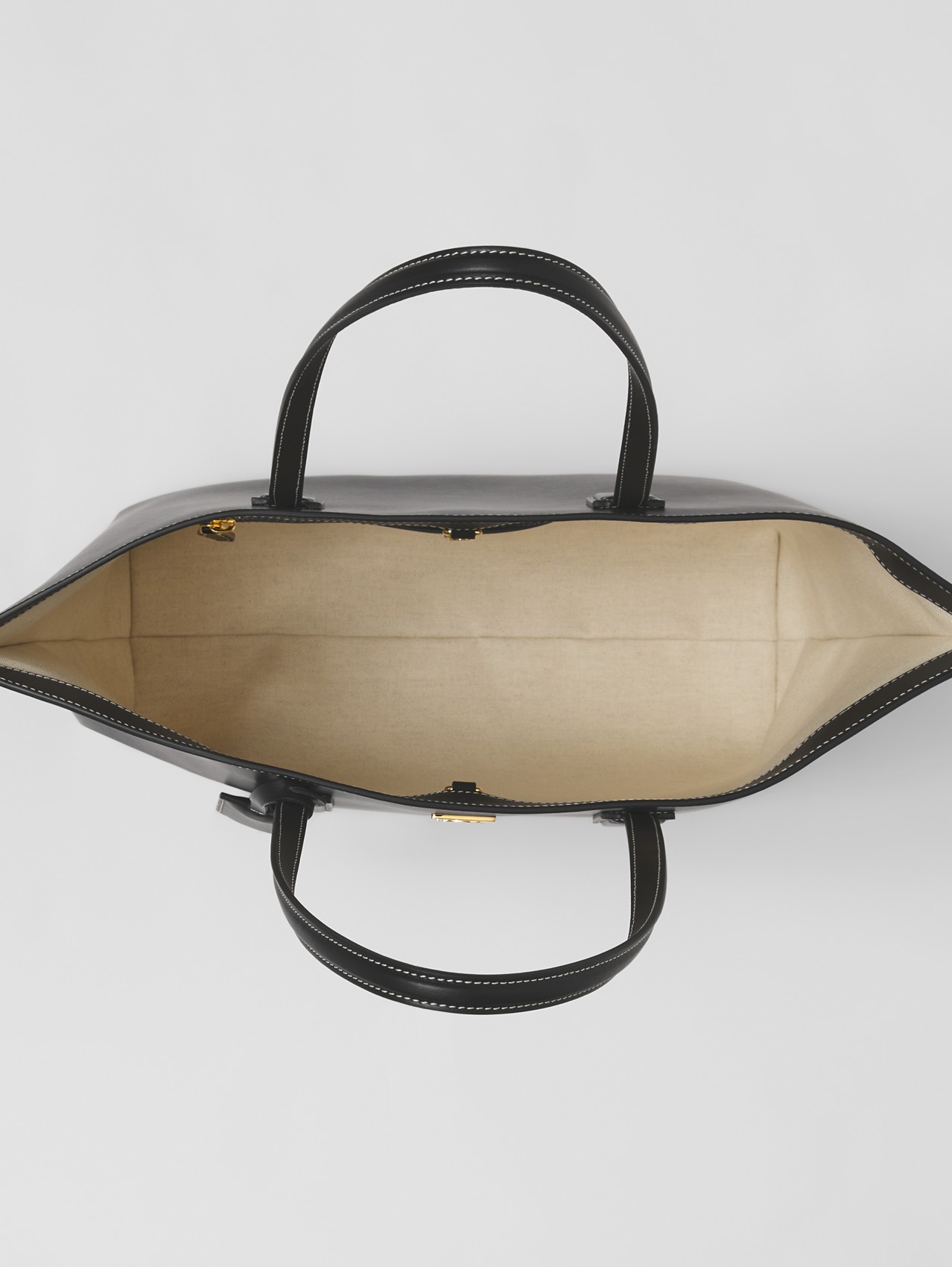 Mittelgroße Lederhenkeltasche mit Monogrammmotiv (Schwarz)