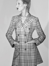 Dolores wears a Vintage check wool mini skirt
