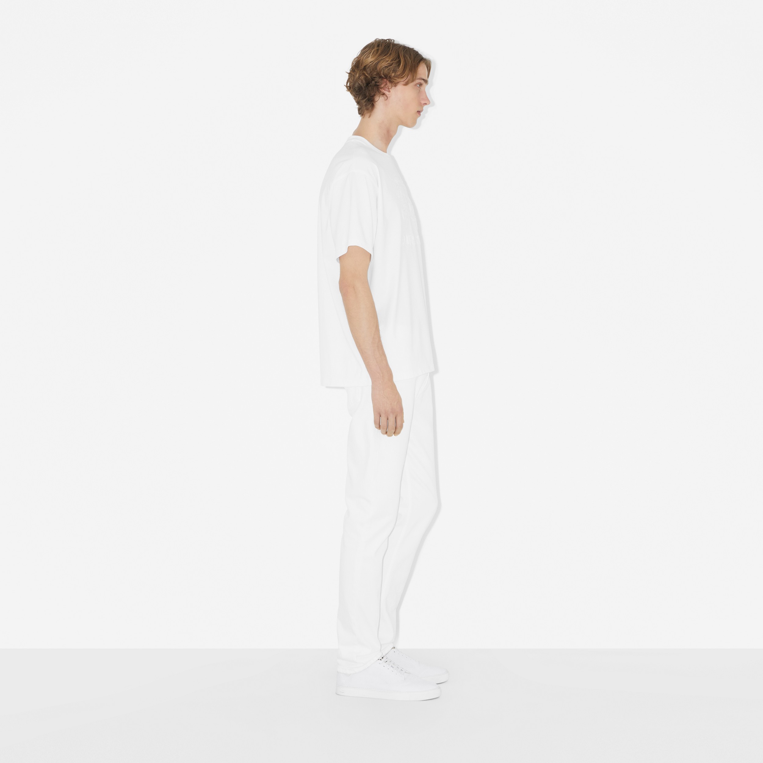 Calças jeans em brim stretch com corte slim (Branco) - Homens | Burberry® oficial - 3
