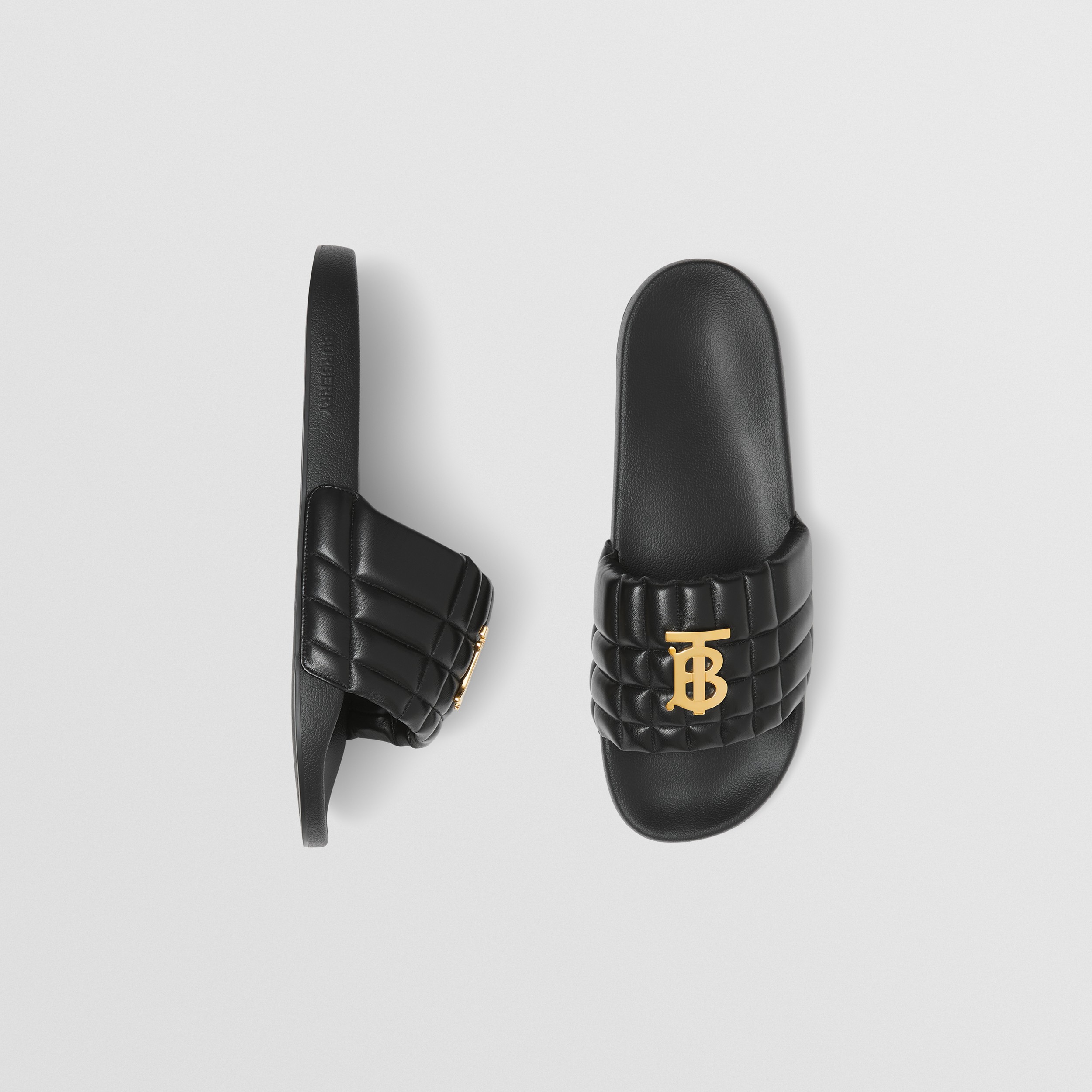 Monogram Motif Quilted Leather Slides in Black - Men | Burberry® Official - 1