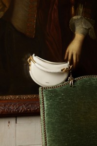 Shot of Bridle Clutch in colour Soap beige