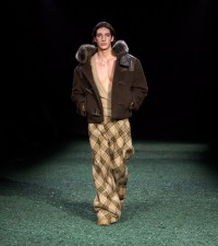 Model in Shearling trim wool cashmere duffle jacket in camp