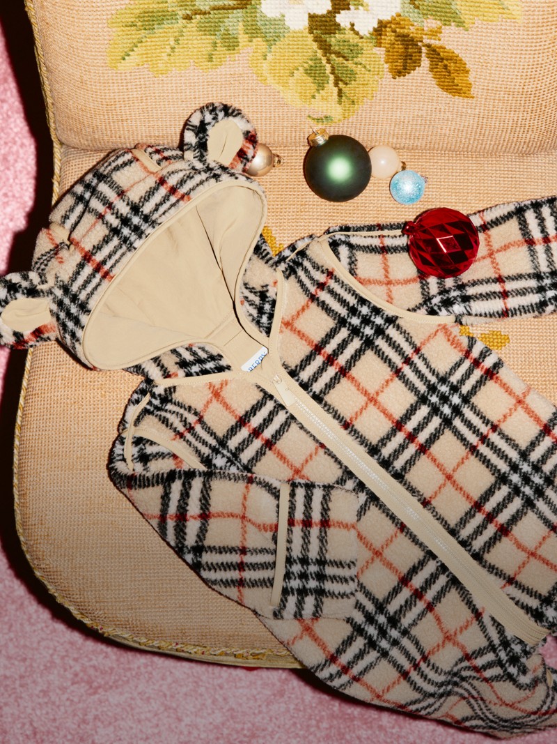 Burberry Festive Campaign featuring Burberry Childrenswear Check Fleece Hooded Jumpsuit.