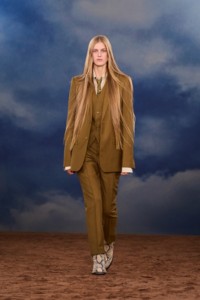 Burberry SS26 Show model Iris Lasnet wearing a Wool mohair tailored jacket and Python print leather Ledger boots