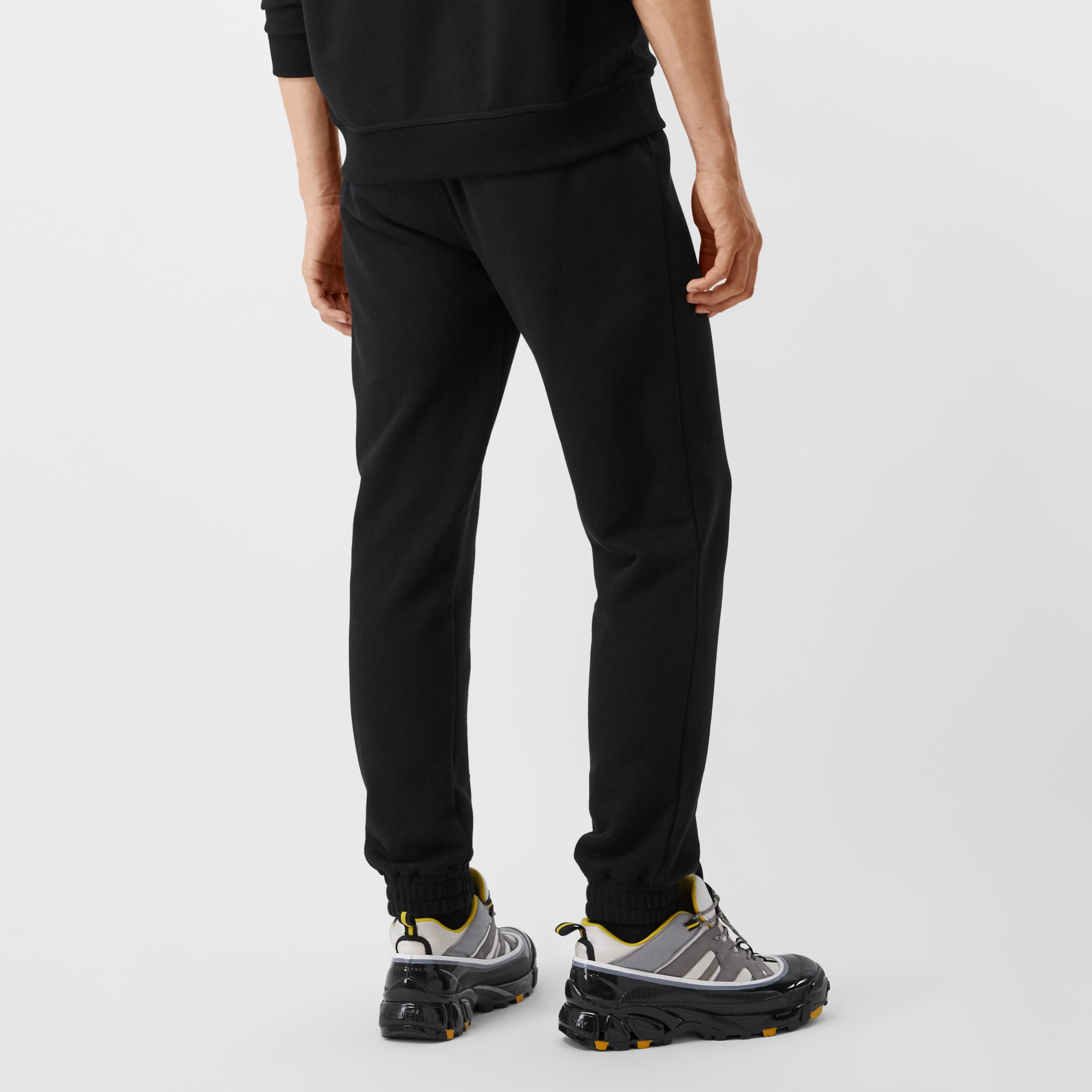 Monogram Motif Cotton Jogging Pants in Black Men Burberry® Official