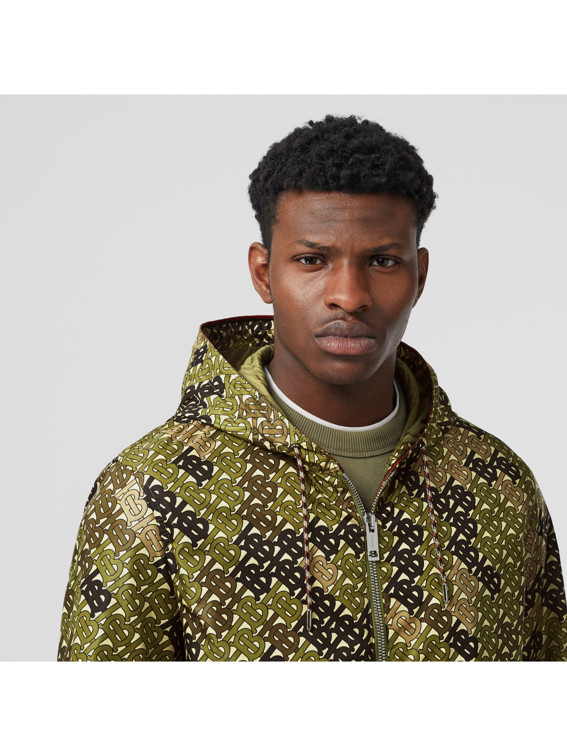 monogram print nylon hooded jacket in khaki green | burberry