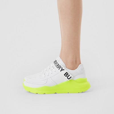 fluorescent yellow sneakers