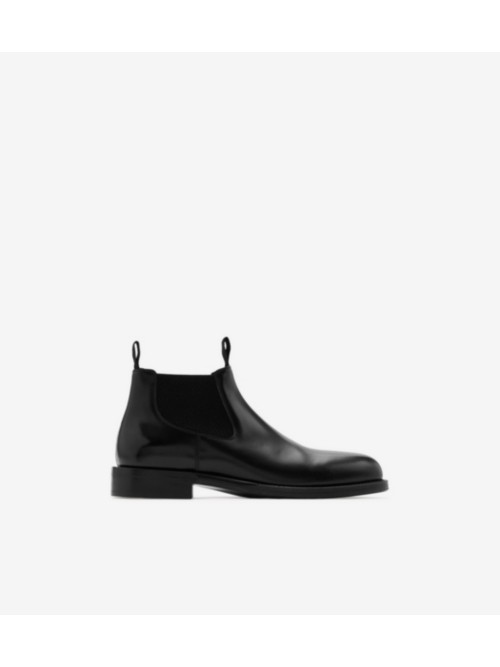 Shop Burberry Leather Tux Low Chelsea Boots​ In Black