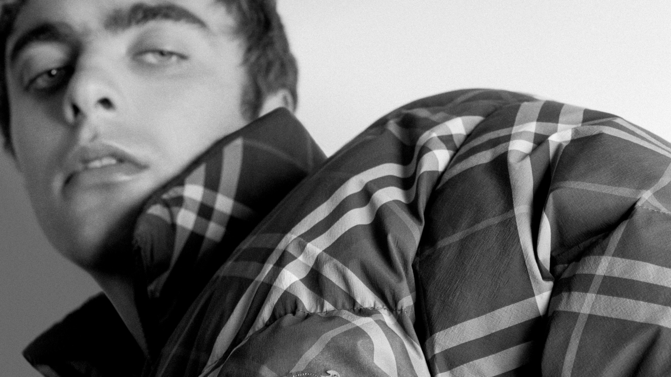 Lennon Gallagher modeling for Burberry wearing Check Puffer Jacket