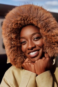 Rapper Little Simz wearing Burberry Parka Jacket with Fur Hood