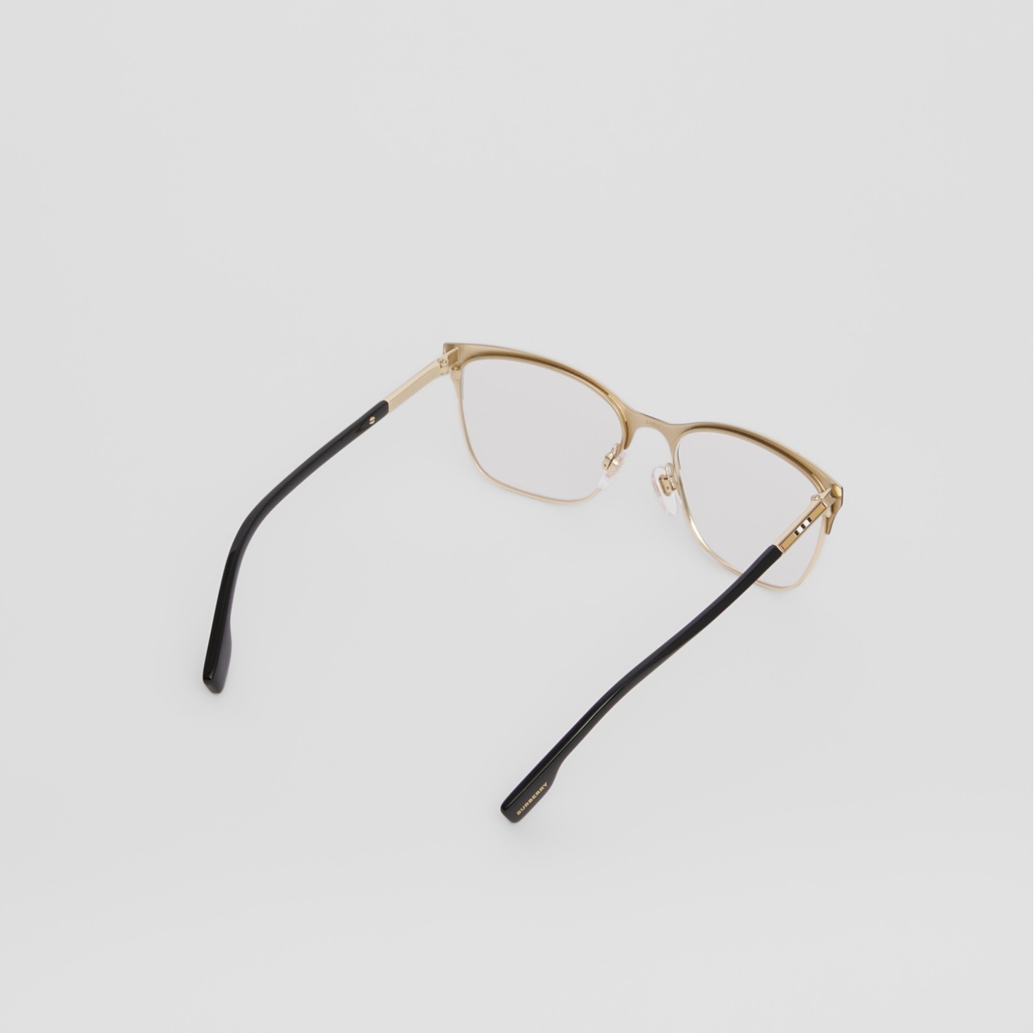 Monture œil-de-chat pour lunettes de vue avec rayures iconiques