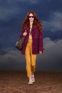 Burberry SS26 Show model Charlotte Moffat wearing a Paisley perforated suede trench coat and Leather Baez sandals