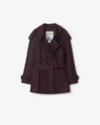Burberry Winter 2025 Campaign featuring Short Gabardine Fitzrovia Trench Coat in the colour Wine red