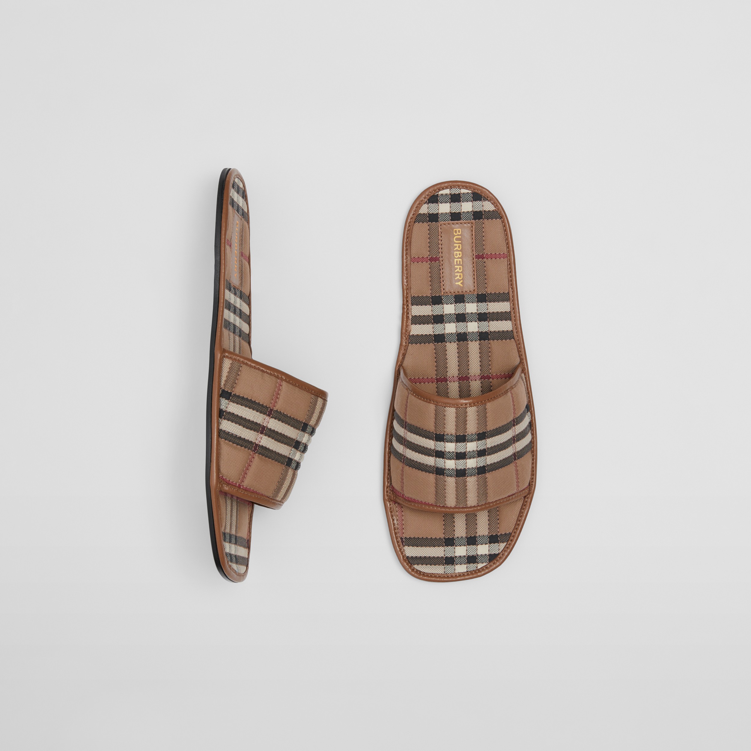Slides im Karosteppdesign aus Baumwolle und Leder (Birkenbraun) - Damen | Burberry® - 1