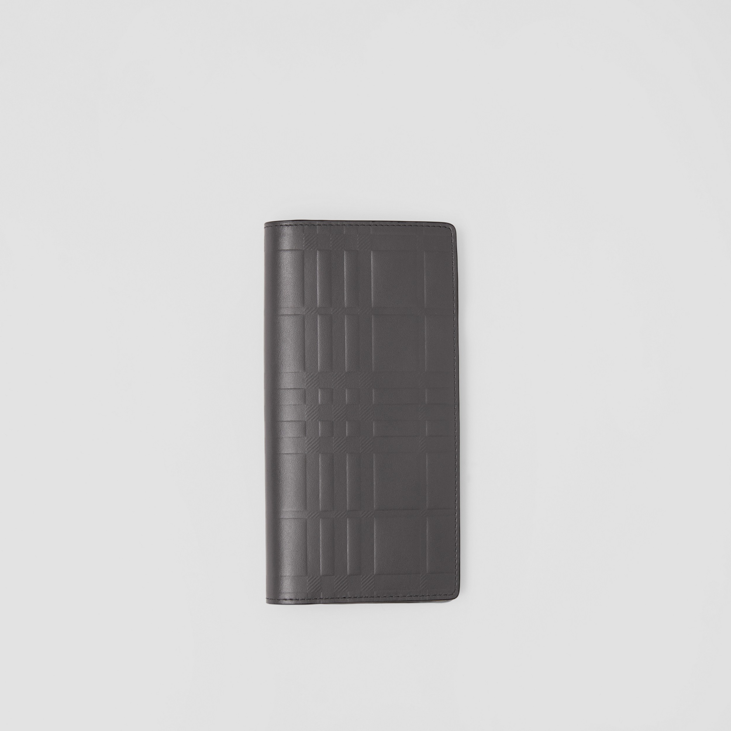 Carteira continental de couro com estampa xadrez em relevo (Cinza Escuro) - Homens | Burberry® oficial - 1