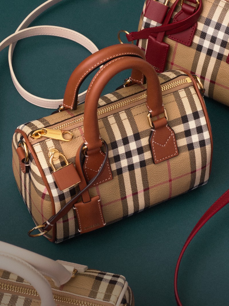 Collection of Mini Check Bowling Bags in signature Burberry check with leather top handles and detachable shoulder straps.