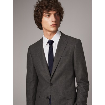 black suit with burberry tie