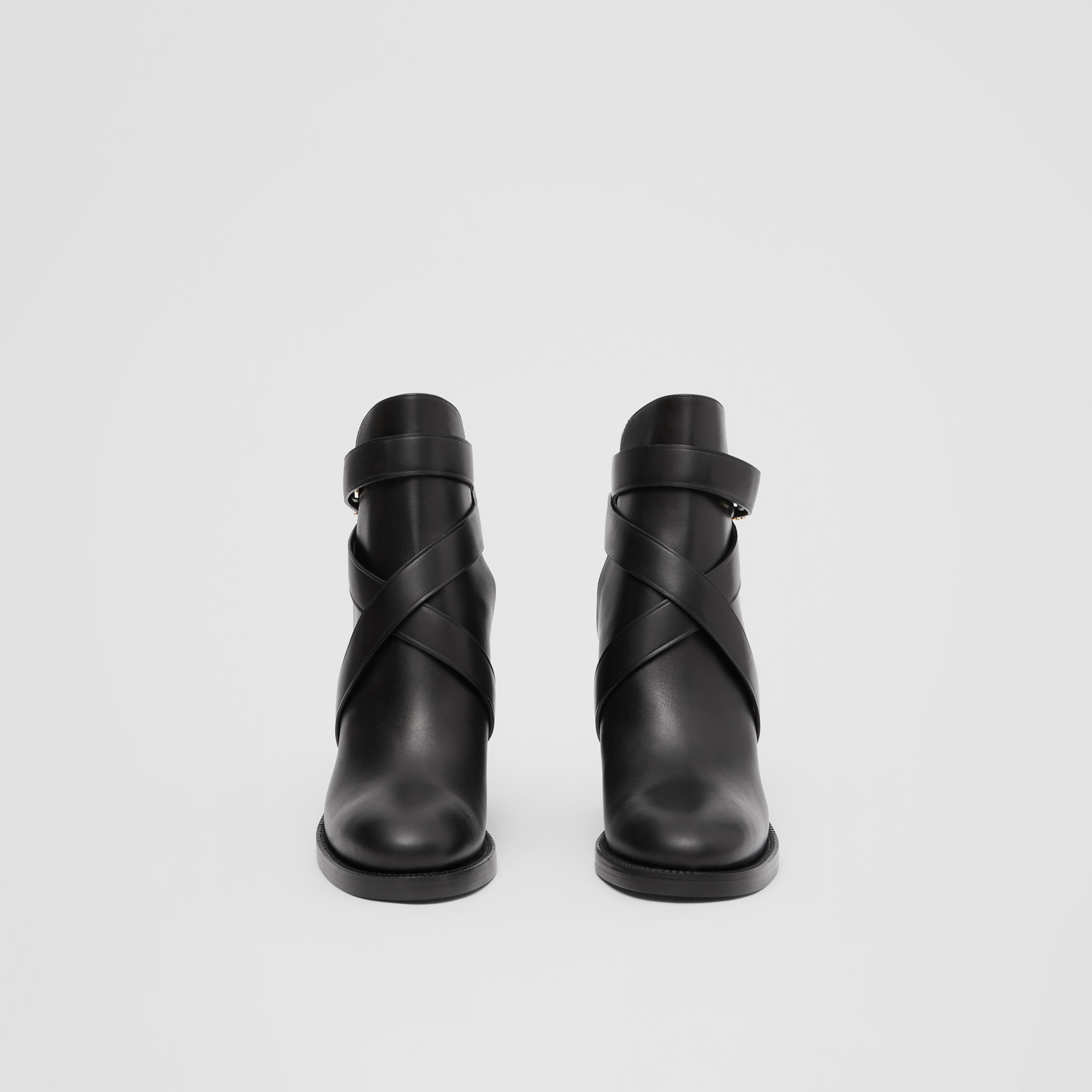 monogram buckle cleat ankle boots