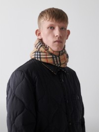 Model wearing Quilted Nylon Bomber Jacket with Check Scarf.