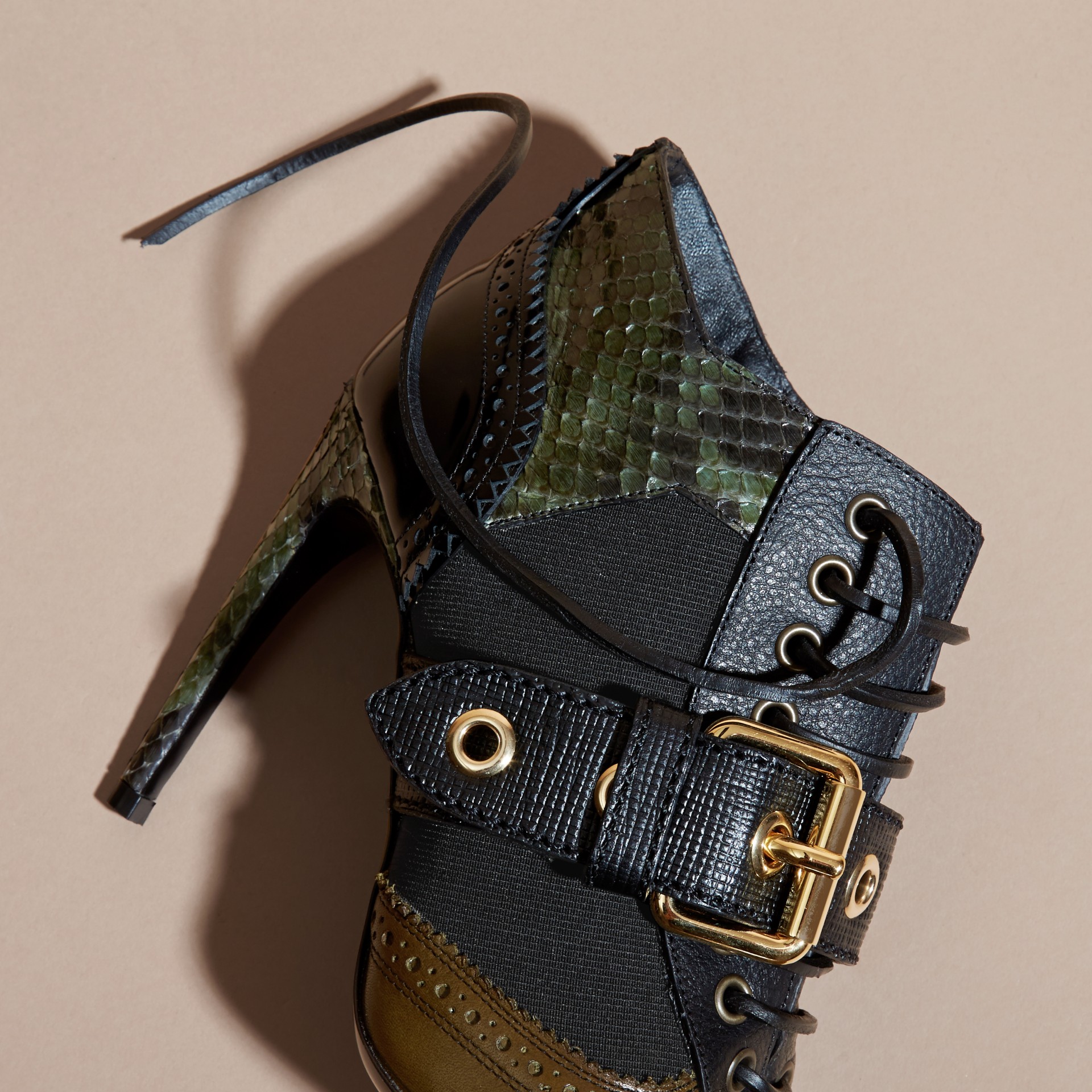 snakeskin buckle boots