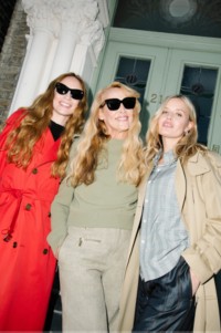 Shot of Jerry Hall and daughters Lizzy and Georgia May Jagger wearing Burberry Trench Coats