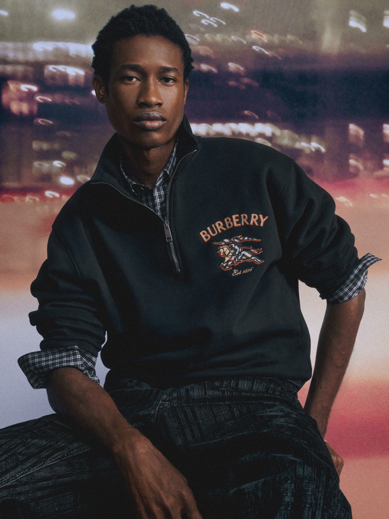 Shot of model wearing the Half Zip Sweatshirt in colour Black
