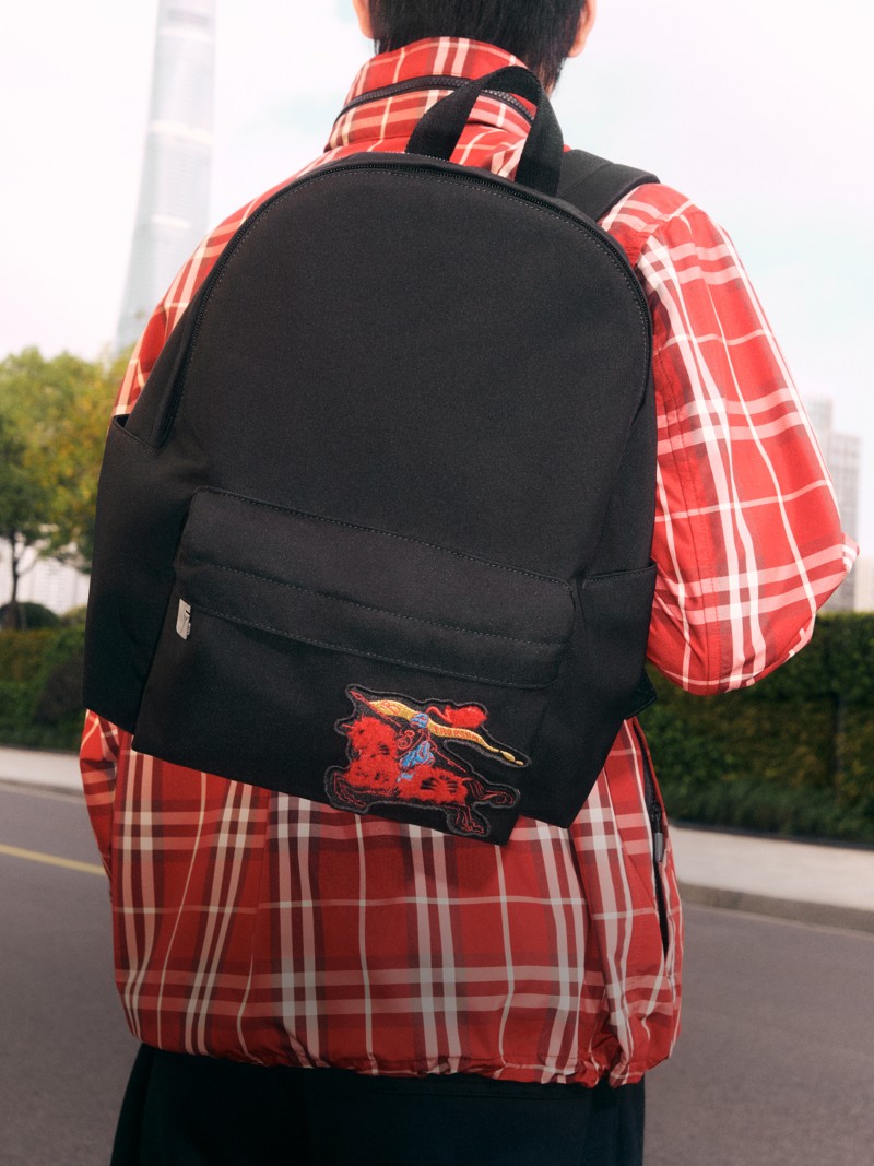 Shot of Model wearing Burberry Check Jacket with Backpack in Black