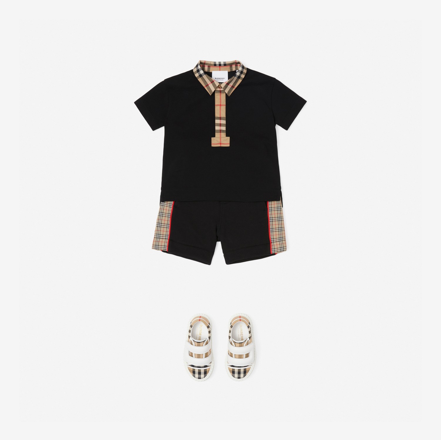 Poloshirt aus Baumwollpiqué mit Vintage Check-Besatz (Schwarz) - Kinder | Burberry®