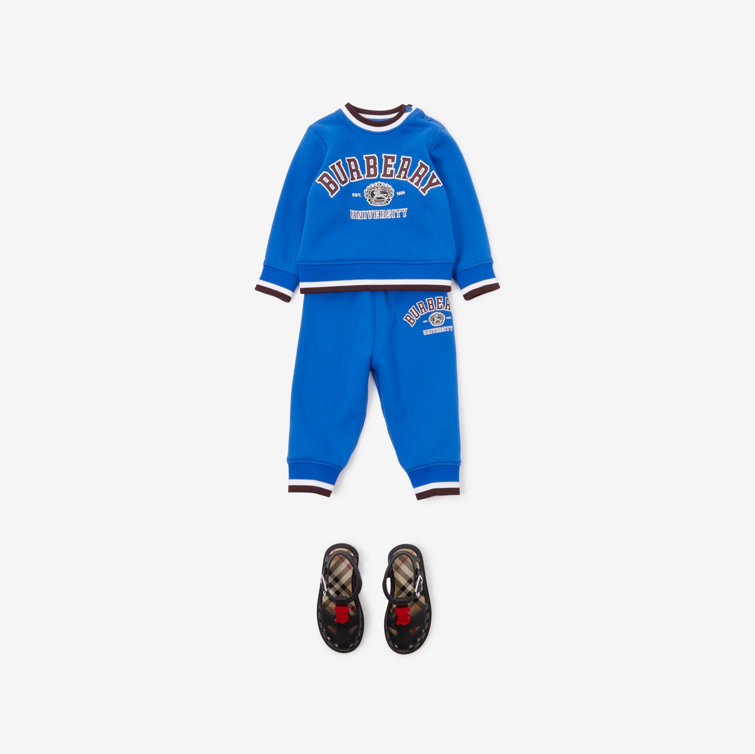 Calças jogger de algodão com estampa gráfica universitária (Azul Lona) - Crianças | Burberry® oficial