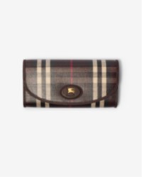 Burberry Winter 2025 Campaign featuring Highlands Continental Wallet in the colour Mahogany red