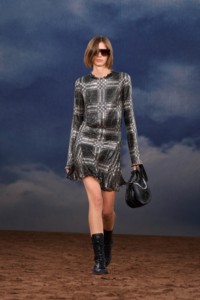 Burberry SS26 Show model Eden Kassner wearing a Check chainmail top and kilt
