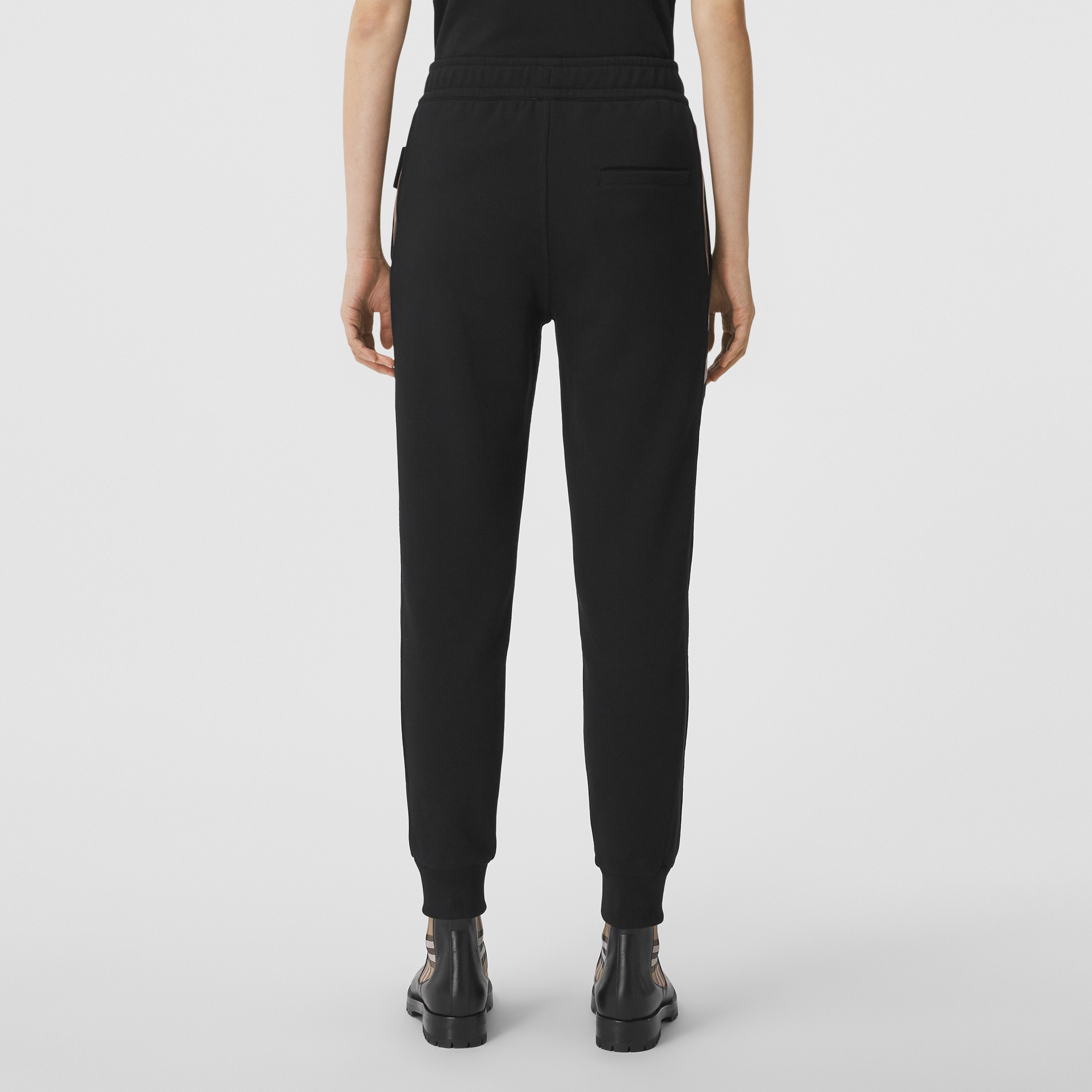 Pantaloni da jogging in cotone con inserti con motivo tartan (Nero) | Sito ufficiale Burberry® - 3