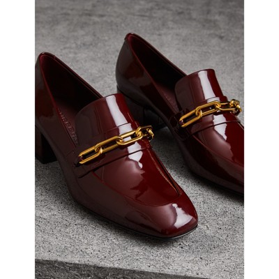 Shop Burberry Link Detail Patent Leather Block heel Loafers In Burgundy Red