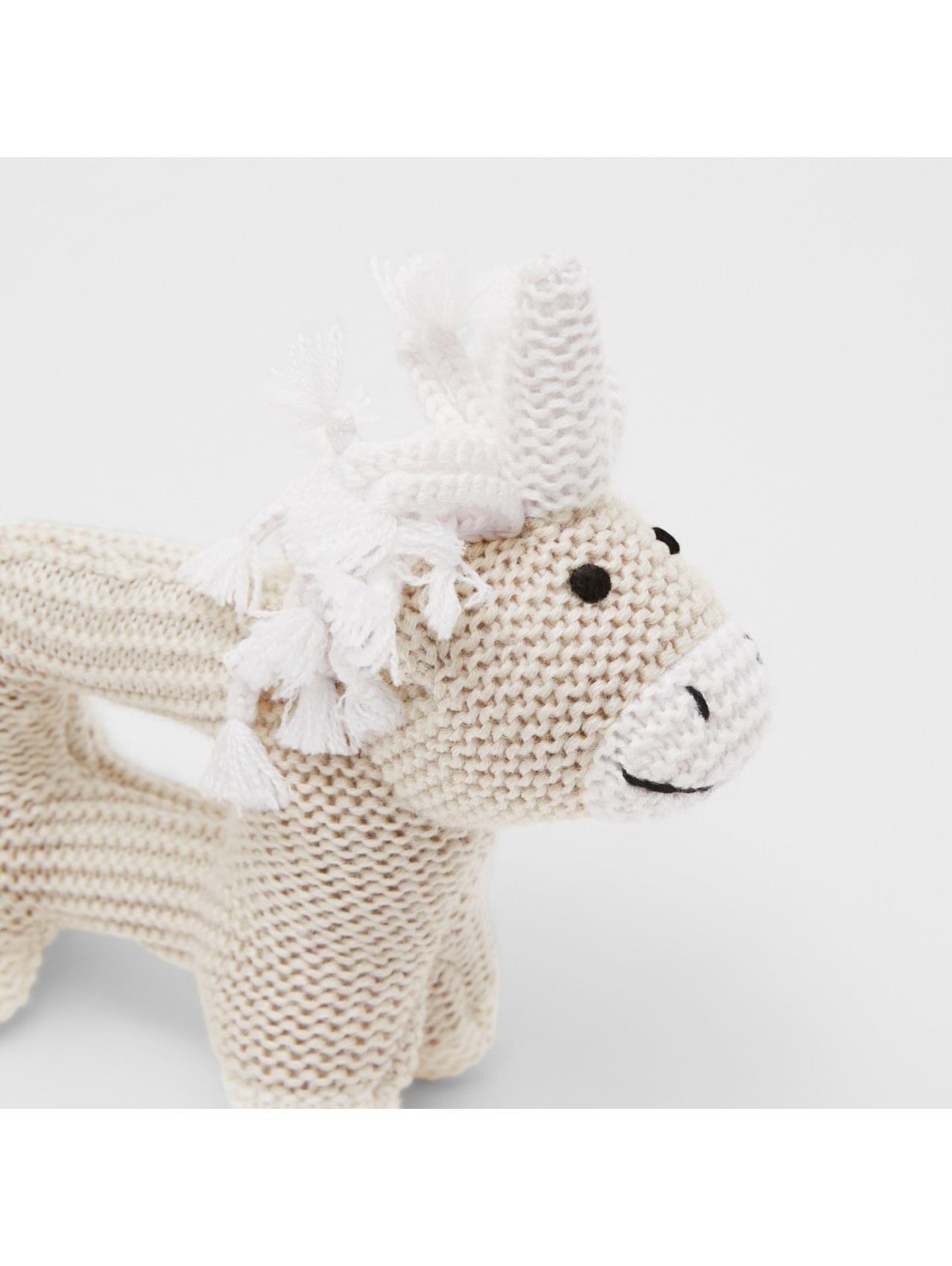 Hochet licorne en laine et soie in Camaïeu De Grèges