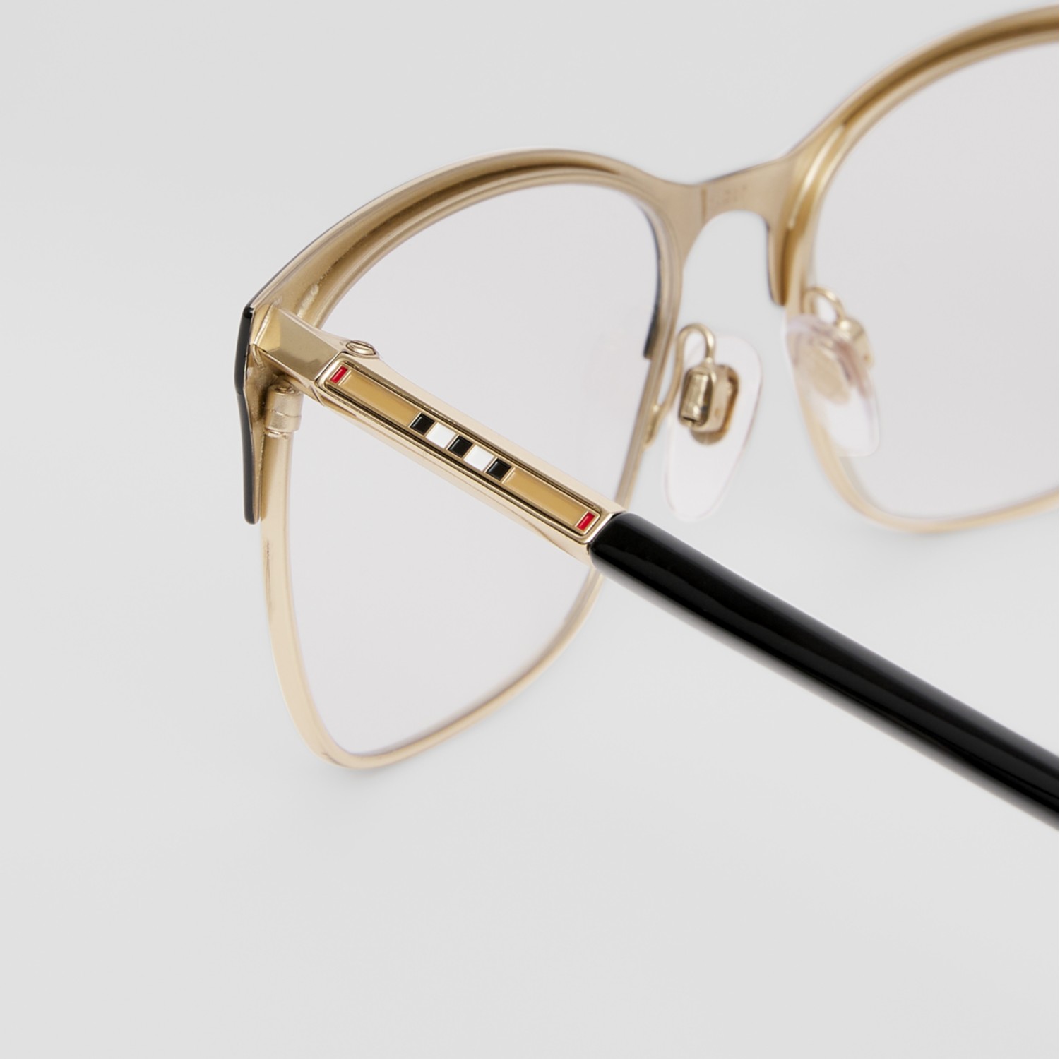 Monture il de chat pour lunettes de vue avec rayures iconiques Noir Femme Site officiel Burberry