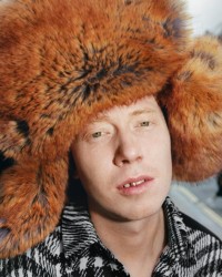 Model wearing Faux Fur and Nylon Trapper Hat